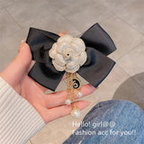 Vintage Flower Brooch with Pearl Tassel and Bowknot Design