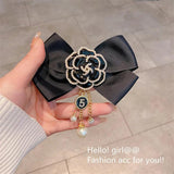 Vintage Flower Brooch with Pearl Tassel and Bowknot Design
