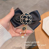 Vintage Flower Brooch with Pearl Tassel and Bowknot Design