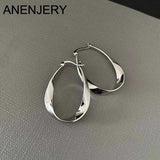 Silver Geometric Twisted Hoop Earrings for Women