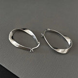 Silver Geometric Twisted Hoop Earrings for Women