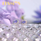 Tanzanite Stud Zircon Earrings in Sterling Silver