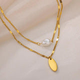 Stainless Steel Oval Pendant Necklace with Pearl Charm