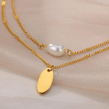 Stainless Steel Oval Pendant Necklace with Pearl Charm