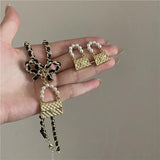 French Hand Woven Leather Rope Chain Bow Necklace