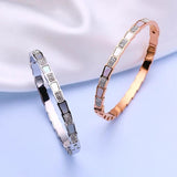 Zircon Inlaid Snake Bone Bracelet Snap Bangle