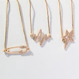 KC Gold Cubic Zirconia Safety Pin Charm Bracelet