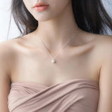Sterling Silver Shell Necklace with Freshwater Pearl Pendant