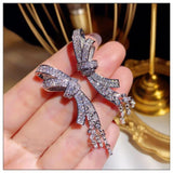 Silver Glitter Zircon Gemstone Bow Tassel Earrings