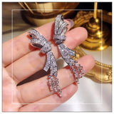 Silver Glitter Zircon Gemstone Bow Tassel Earrings