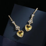 925 Silver Heart-shaped Drop Earrings with Yellow Gemstone