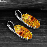 Vintage Amber Claw Earrings Antique Silver Plated Flower Resin Bead