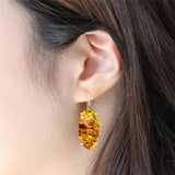 Vintage Amber Claw Earrings Antique Silver Plated Flower Resin Bead
