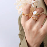 Stainless Steel Oval Hollow Adjustable Couple Ring Plated 18K BSA273