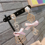 Bow No.5 Camellia Pearl Asymmetric Earrings Crystal Earrings