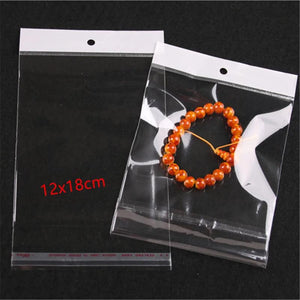 100pcs 12*18cm Clear Self Adhesive OPP Bags with Hole