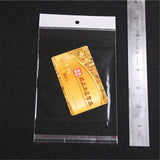 100pcs 12*18cm Clear Self Adhesive OPP Bags with Hole