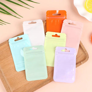 100PCS Flat Glossy Plastic Hanging Bags Resealable Gift Pouches
