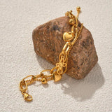 Stainless Steel Gold-Plated Layered Bracelet with Heart Cross Pendant