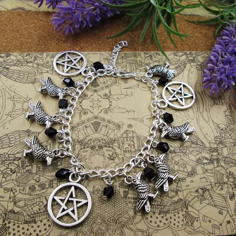 Silver Plated Charm Bracelet with Birds and Stars Pendant