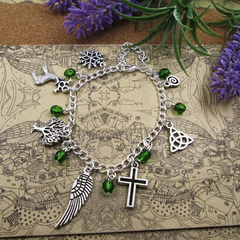 Silver Plated Charm Bracelet Wicca Cross Wing Tree Snowflake