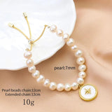 Freshwater Pearl Bracelet with Shell Disc Compass Charms