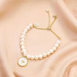 Freshwater Pearl Bracelet with Shell Disc Compass Charms
