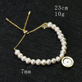 Freshwater Pearl Bracelet with Shell Disc Compass Charms