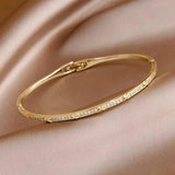 Classic Zirconia Cross Charm Bracelet 14K Plated Knot Bangle