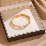 Stainless Steel Bangle with Devil Eye Charm