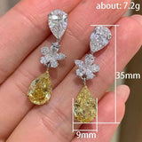 Silver Flower Lab Topaz Diamond Dangle Earrings