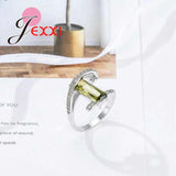 Arrival Curve Rings with Olive CZ 925 Sterling Silver Needle