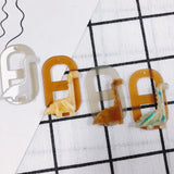 20pcs 46*38mm Hollow Out Geometry Dinosaur Resin Pendant