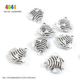 Tropical Fish Leaf Charms Twisted Ring Windmill House