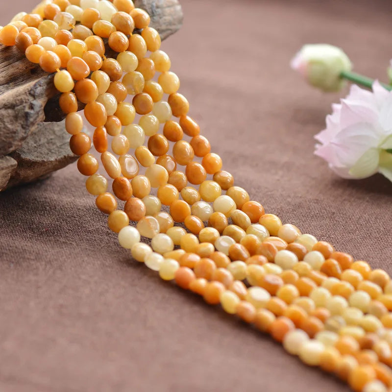 Natural Multi-tone Yellow Jade Beads 7x9mm Irregular Shape 15 Inch Strand