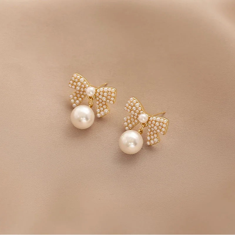 Karopel Sweet Classic Pearl Bow Dangle Earrings for Women