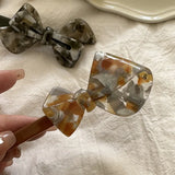Acetic Acid Textured Bow Hairpins Side Clip