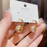 Fashionable Pearl Circle Earrings with Minimalist Design