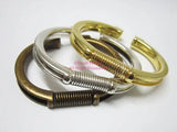 Spring cuff bracelet with groove