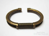 Spring cuff bracelet with groove