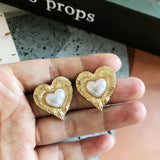 Heart Metal Stud Earrings with Pearl Detail