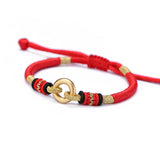 Sterling Silver Red Rope Bracelet with Peace Buckle Knots