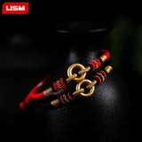 Sterling Silver Red Rope Bracelet with Peace Buckle Knots