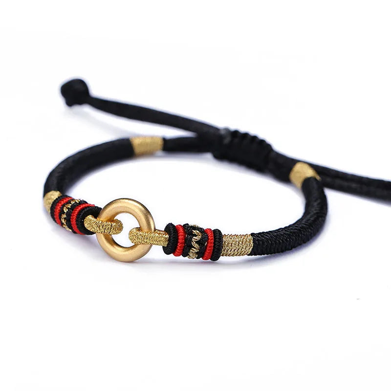 Sterling Silver Red Rope Bracelet with Peace Buckle Knots