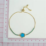 Flower Charm Bracelet with Shell Pendant