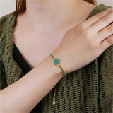 Flower Charm Bracelet with Shell Pendant