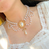 Vintage Style Pearl Choker Necklace Bowknot Pendant Jewelry