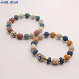 Colorful Volcanic Stone Bracelet with Cubic Zirconia Eye Beads