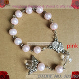 Glass Pearl Rosary Bracelet with Angel Wing Pendant