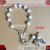 Glass Pearl Rosary Bracelet with Angel Wing Pendant